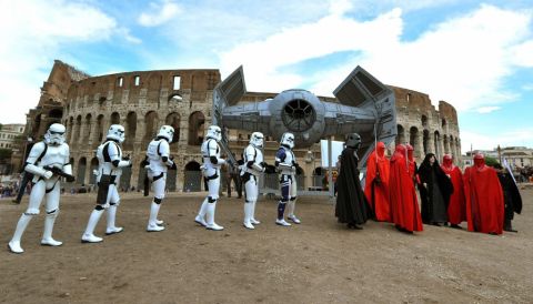 Members of a "Star Wars" fan club celebrate "Star Wars Day" in front of the Colosseum in central Rome.