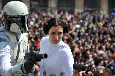 Members of a "Star Wars" fan club dress as characters from the movie outside Rome's Colosseum. 
