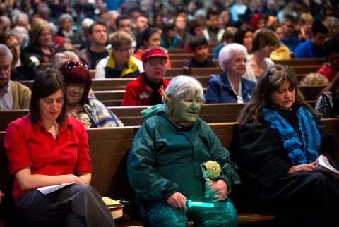 Freeda Elliott, 78, dresses as the "Star Wars" character Yoda while attending a "Star Wars"-themed church service at St. Andrew's-Wesley United Church in Vancouver, British Columbia.