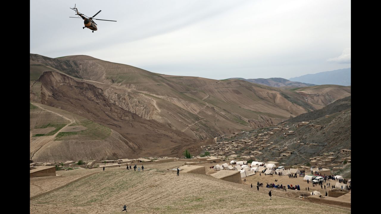 A helicopter flies over survivors on May 4.
