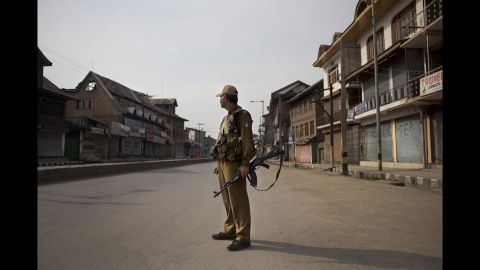 An Indian soldier stands in the middle of an empty Srinagar street Wednesday, April 30, following calls by rebels and separatist politicians to boycott the parliamentary elections.