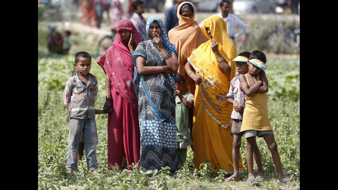 Women and children attend an election rally in Amethi, India, on Saturday, May 3.