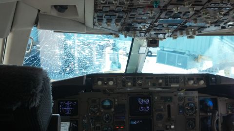A CNN iReporter caught this picture of her airplane's damaged windshield after landing. 