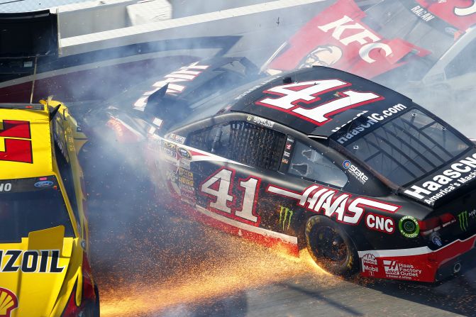 From left, Joey Logano, Kurt Busch and David Ragan wreck Sunday, May 4, during the NASCAR Sprint Cup race in Talladega, Alabama. Denny Hamlin won the race for his first win of the season.