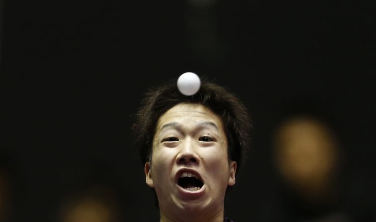 Japan's Jun Mizutani eyes the ball as he hits a return during a match at the World Team Table Tennis Championships in Tokyo on Tuesday, April 29. China eventually won both the men's and women's competitions.