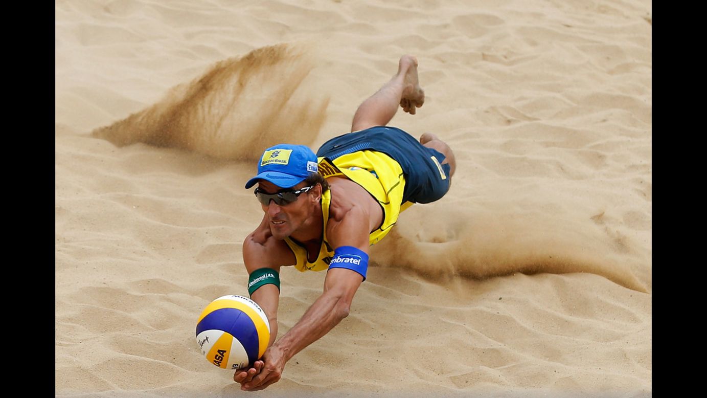 Beach volleyball player Emanuel Rego dives during a match Saturday, May 3, at the Shanghai Jinshan Grand Slam in China. Rego and Pedro Salgado lost in the semifinals to the eventual tournament winners, Paolo Nicolai and Daniele Lupo of Italy.