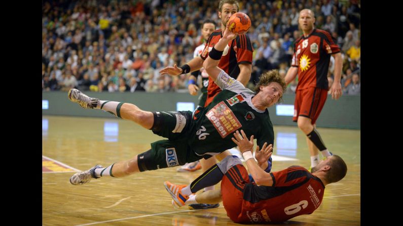 Jesper Nielsen of Fuchse Berlin looks toward goal during a German league handball match against TuS Nettelstedt-Lubbecke on Sunday, May 4. 