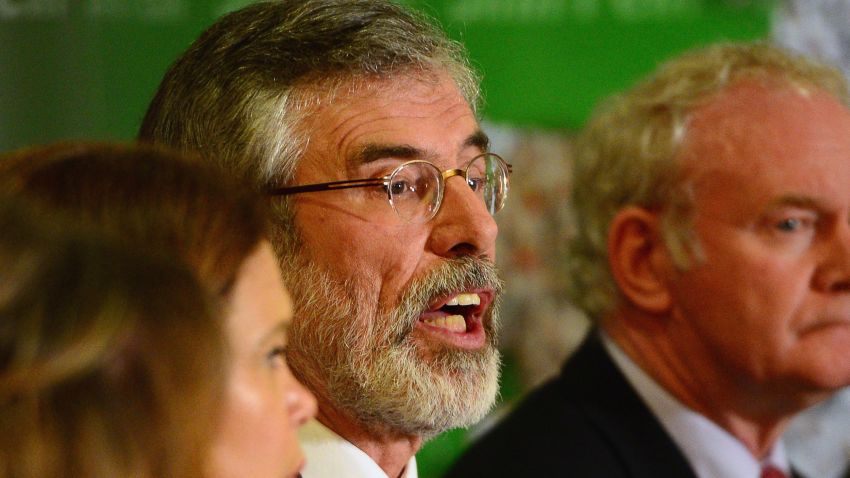 BELFAST, NORTHERN IRELAND - MAY 04: Sinn Fein Leader Gerry Adams (L) speaks alongside Deputy First Minister of Northern Ireland, Martin McGuinness, during a press conference at Balmoral Hotel after he was released from Antrim PSNI Station without charge following questioning over the Jean McConville murder, on May 4, 2014 in Belfast, Northern Ireland. (Photo by Jeff J Mitchell/Getty Images)