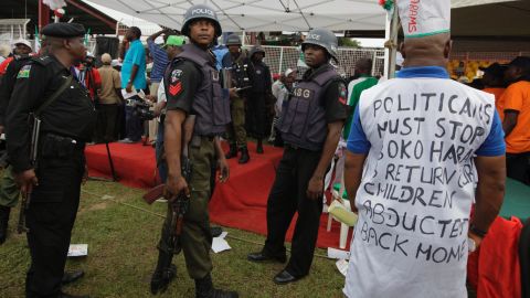 Police stand guard during a demonstration in Lagos on May 1.