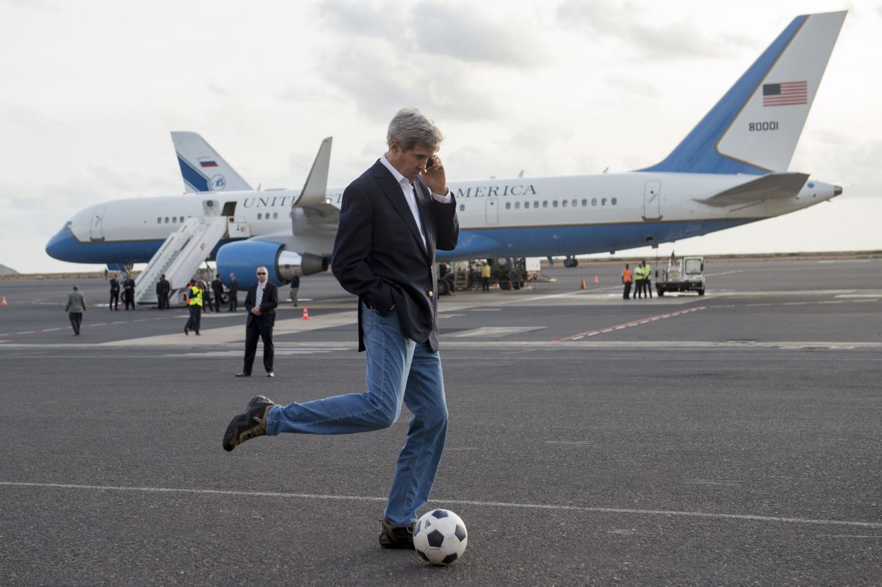 Kerry kicks around a soccer ball during an airplane refueling stop at Sal Island, Cape Verde, on Monday, May 5, 2014. Kerry was on his first major tour of Africa, focusing on some of the continent's most brutal conflicts.