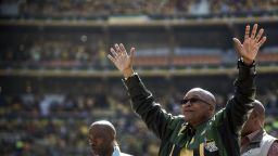 South African President and African National Congress president Jacob Zuma (C) greets supporters during the final ANC election campaign rally at Soccer City stadium on May 4, 2014 in Johannesburg, South Africa.