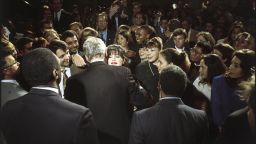 Monica Lewinsky embraces then-President Bill Clinton at a Democratic fundraiser in Washington in October 1996.