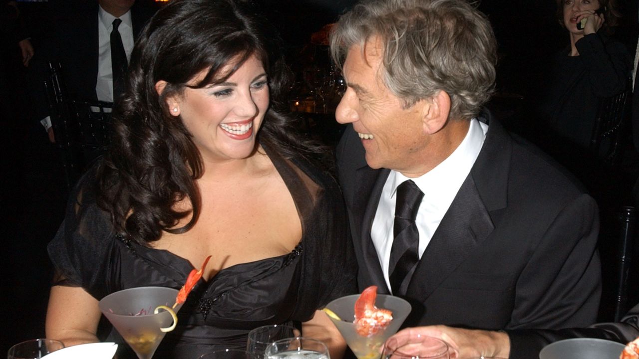 Lewinsky laughs with actor Ian McKellen at the 2002 GQ Men of the Year Awards in New York City.