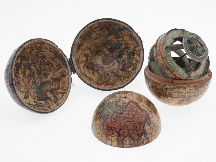 This pocket globe, from around 1715, is less than three inches across. 