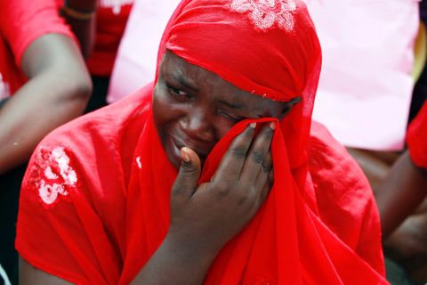 A woman attends a demonstration Tuesday, May 6, that called for the Nigerian government to rescue the girls.