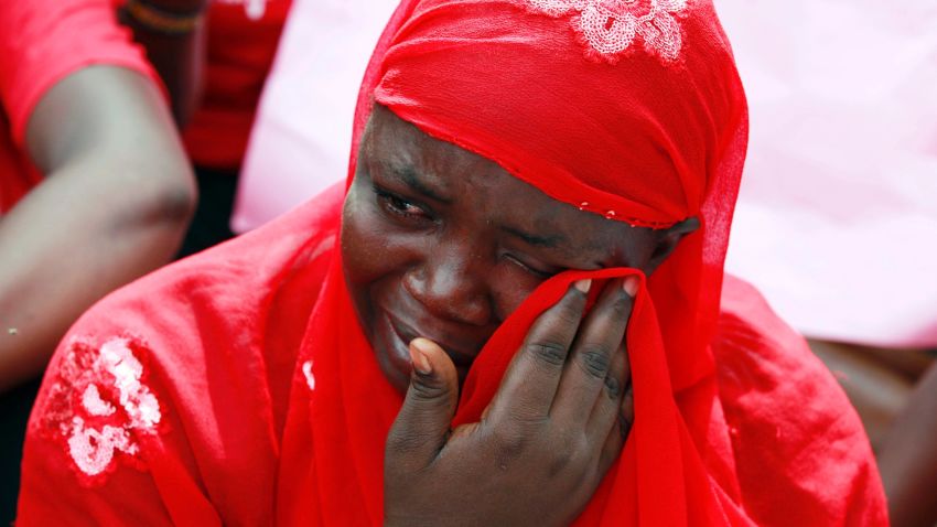 A woman attends a demonstration calling on the government to rescue the kidnapped school girls of a government secondary school Chibok, outside the defense headquarters in Abuja, Nigeria, Tuesday May 6, 2014.