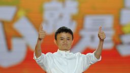 File: Alibaba founder Jack Ma gives a thumbs up after speaking at an event to mark the 10th anniversary of China's most popular online shopping destination Taobao Marketplace in Hangzhou on May 10, 2013. As Ma steps aside after building the world's largest online retailer, the Chinese firm is preparing a huge stock offer prompting comparisons with Facebook -- whose profits it dwarfs. AFP PHOTO/Peter PARKS (Photo credit should read PETER PARKS/AFP/Getty Images)