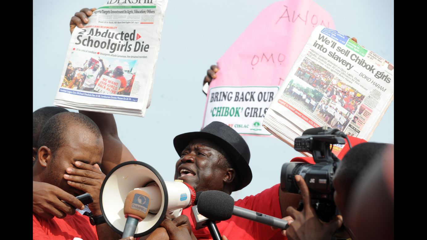 Community leader Hosea Sambido speaks during a May 6 rally in Abuja.