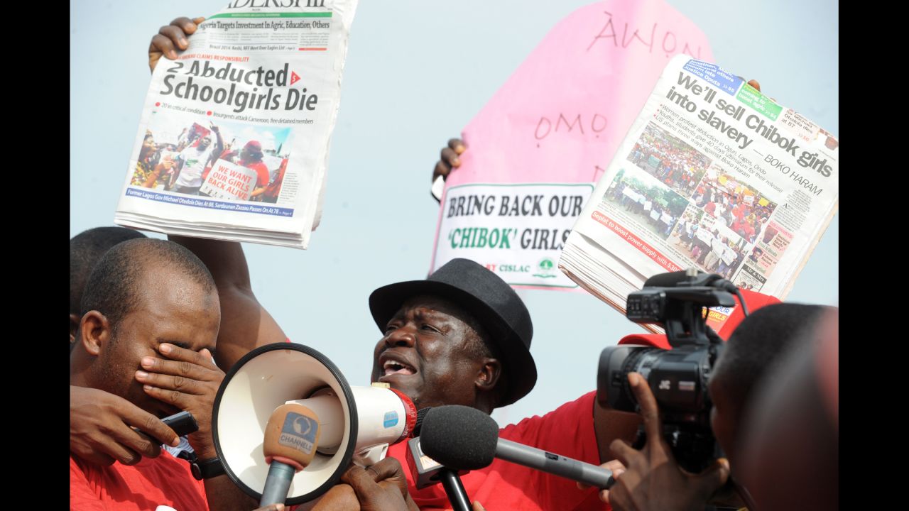 Community leader Hosea Sambido speaks during a May 6 rally in Abuja.