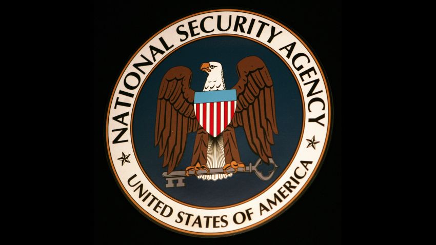 Fort Meade, UNITED STATES:  The logo of the National Security Agency (NSA) hangs at the Threat Operations Center inside the NSA in the Washington suburb of Fort Meade, Maryland, 25 January 2006. US President George W. Bush delivered a speech behind closed doors and met with employees in advance of Senate hearings on the much-criticized domestic surveillance.   AFP PHOTO/Paul J. RICHARDS  (Photo credit should read PAUL J. RICHARDS/AFP/Getty Images)
