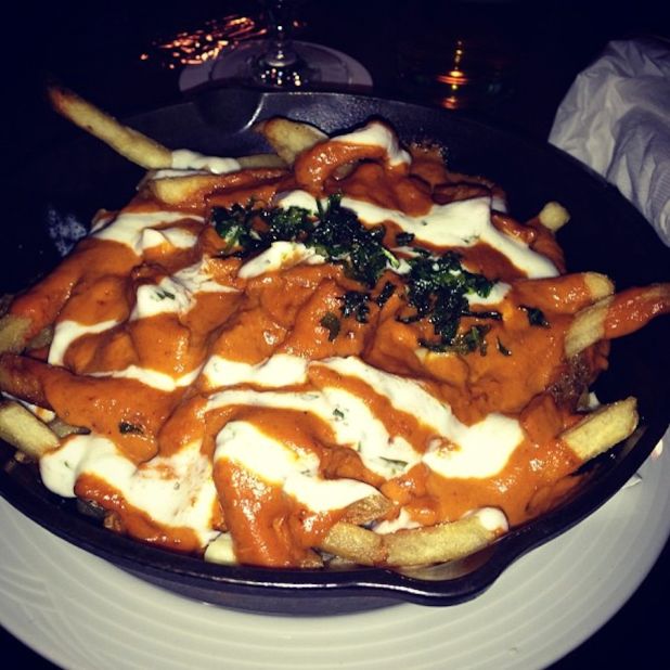 This butter chicken poutine was served at a pub in Canada's Fairmont Chateau Lake Louise hotel. The photographer reports: "Looks so wrong, tastes so right."