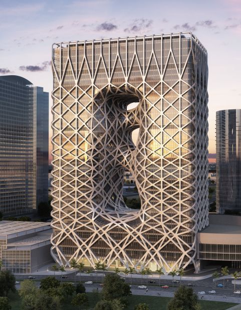 This building, by Zaha Hadid Architects, is the fifth hotel tower of Macau's sprawling City of Dreams complex. It is meant to evoke an abstract lucky number 8. 
