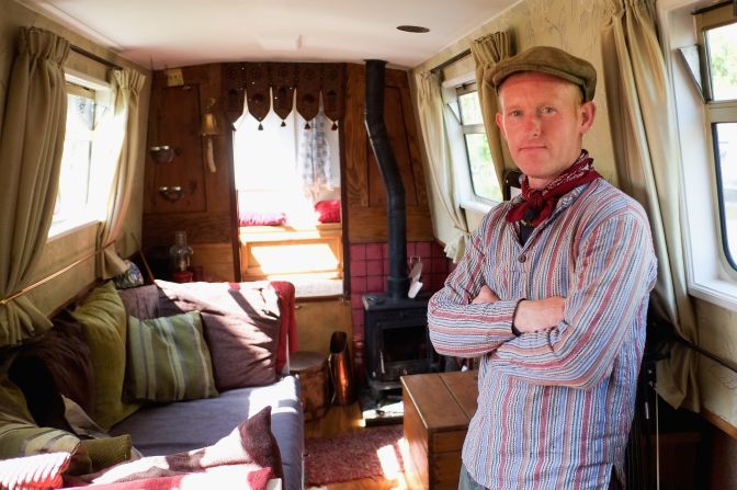 A boat owner offers a sneak peek inside his floating home as part of a three-day Waterway Festival held between the British cities of Leeds and Liverpool.