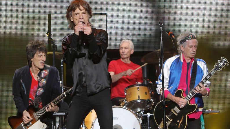 The Rolling Stones formed in 1962 and, while the band has taken breaks, it's never broken up. According to The Rock and Roll Hall of Fame, they hold the record for band longevity. The Stones represented the opposite of the Beatles, according to the biography, epitomizing "the darker, bluesier and more boldly sexual side of rock and roll." They are due to play Australian and New Zealand later this year, after postponing due to the death of singer Mick Jagger's partner, designer L'Wren Scott. Here, Ronnie Wood, Mick Jagger, Charlie Watts and Keith Richards perform at the Mercedes-Benz Arena on March 12, 2014 in Shanghai, China.  
