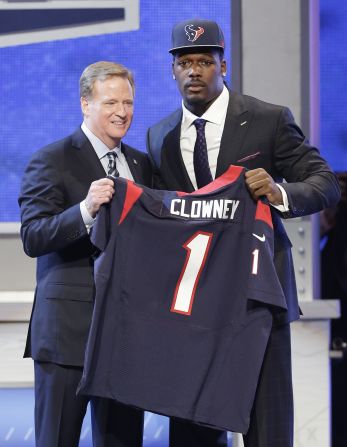 Jadeveon Clowney and NFL Commissioner Roger Goodell hold up a jersey after Clowney was taken by the Houston Texans with the first pick in the NFL Draft on Thursday, May 8, in New York. Clowney played defensive end at the University of South Carolina.