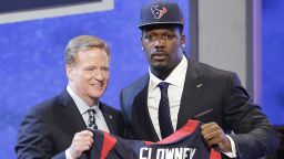 Jadeveon Clowney holds up a Houston Texans Jersey with NFL NFL commissioner Roger Goddel after being chosen as first pick during the 2014 NFL draft on Thursday, May 8 in New York.