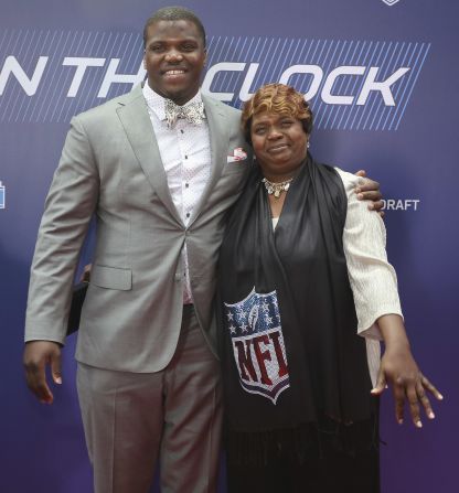 Greg Robinson, an offensive tackle from Auburn who went second overall to the St. Louis Rams, poses with his mother, Rhonda.