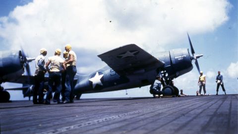 Navy personnel work on board the USS Ranger circa 1942. The Ranger was the first ship to be designed and built specifically as an aircraft carrier. It was the only ship in its class.