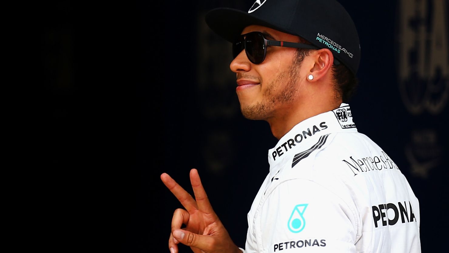Lewis Hamilton celebrates his fourth pole of the season after topping the timesheets in Barcelona.