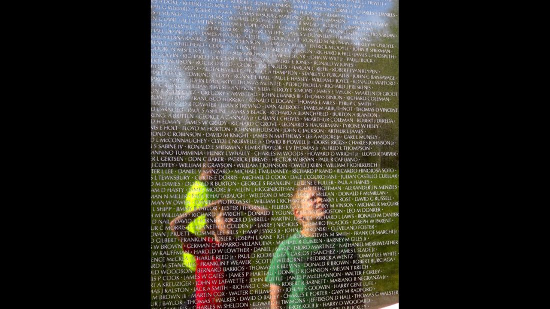 Hussey's sons scanned names on the Vietnam Veterans Memorial during their visit to Washington, D.C. They were searching for John B. Sherman, a college friend of their grandfather's who died during the conflict. "We tried to make everything into a lesson," Hussey said. "We're trying to bring the history to life."