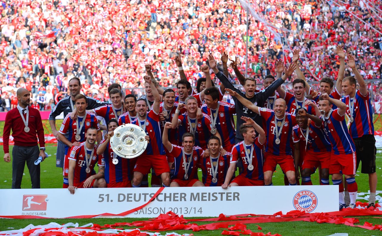 The Bayern squad show off the Bundesliga shield after a 1-0 win over Stuttgart at the Allianz Arena.