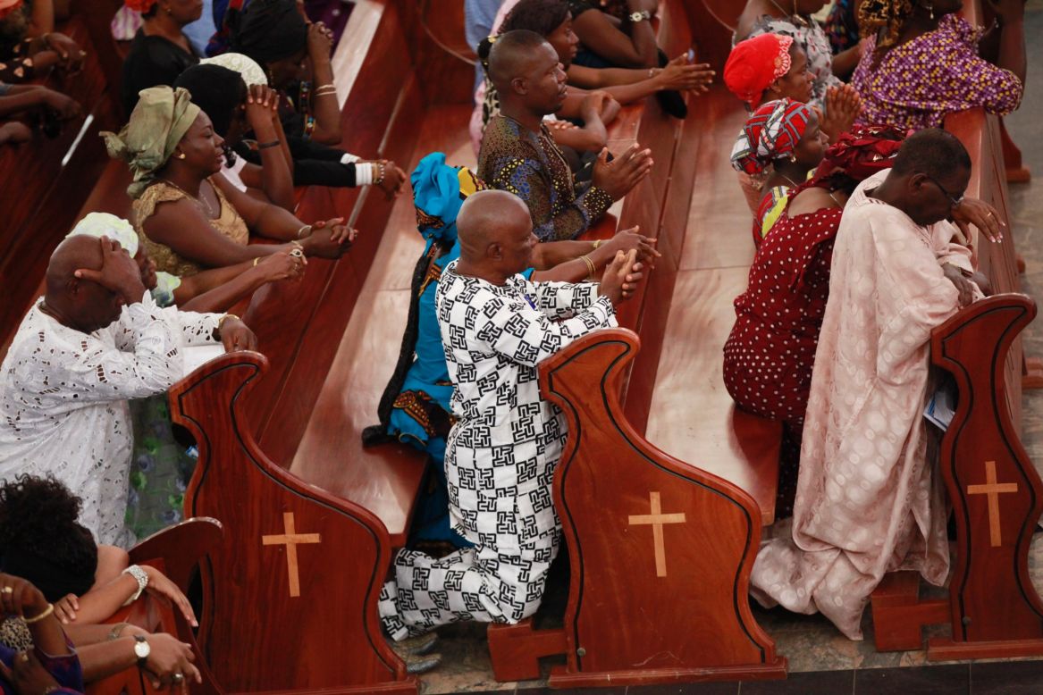 Catholic faithful attend a morning Mass in honor of the kidnapped schoolgirls in Abuja on May 11.