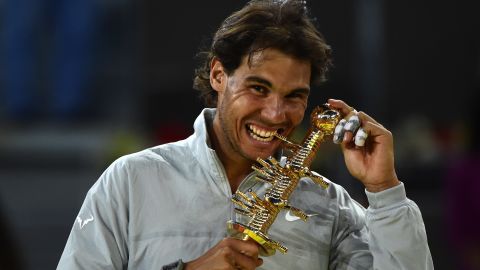 Rafael Nadal poses with the 2014 Madrid Masters trophy.