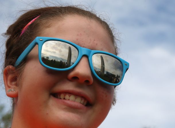 The Washington Monument is reflected in tourist Lani Walatka's sunglasses.