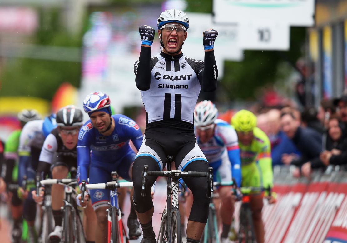 Marcel Kittel of Germany celebrates crossing the finish line to win the second stage of the 2014 Giro d'Italia in Belfast, Northern Ireland, on Saturday, May 10.