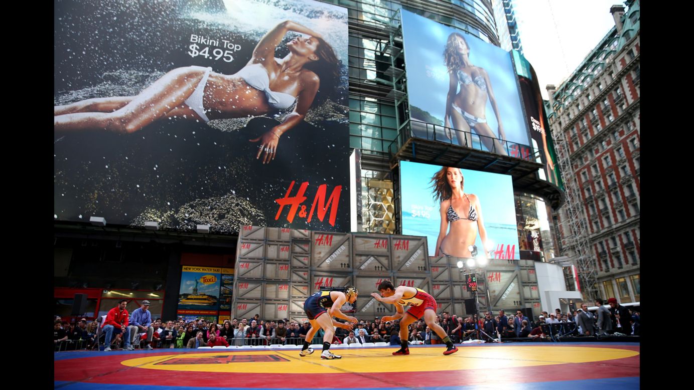 Wrestlers compete in the Beat the Streets Wrestling Exhibition at Times Square in New York on Wednesday, May 7.