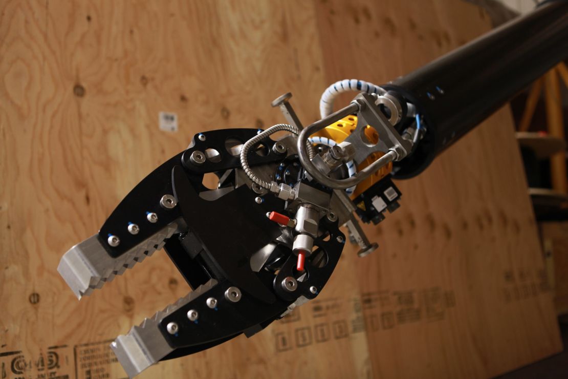 This robotic arm is equipped with radiation-shielded cameras and is capable of lifting 100 pounds.