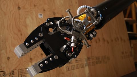This robotic arm is equipped with radiation-shielded cameras and is capable of lifting 100 pounds.