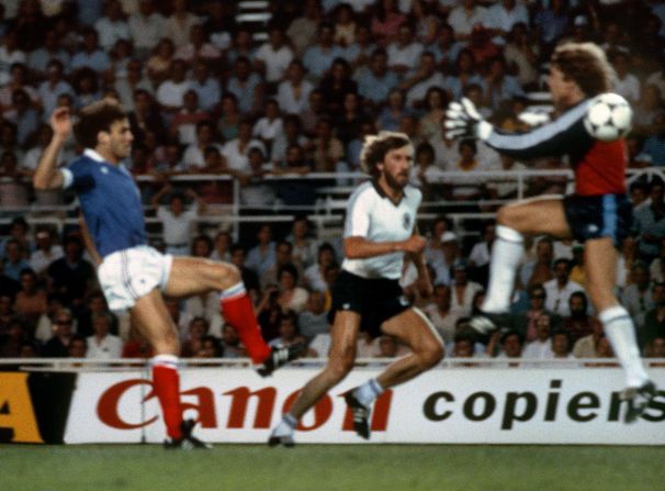 The 1982 semifinal between West Germany and France is remembered for stomach-turning scenes when German keeper Harald Schumacher (R) came out of his goal, ignored the ball and body slammed Patrick Battiston (L), who left the field on a stretcher.