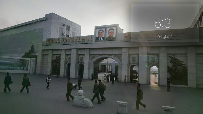 The words beside the two photos translate roughly as "Long live the The Great Leader Kim Jong-un," and "Long Live the Sun-Like Workers' Party of Korea."