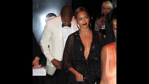 Beyonce placidly faces photographers upon leaving the party as her husband follows. In the video footage, it appeared that the man resembling Jay Z refrained from engaging in the fight.