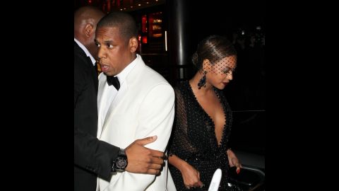 According to reports, Jay Z and Beyonce, who married in 2008, walked out together but then departed in separate cars. <a href="http://www.people.com/article/beyonce-left-with-solange-after-sister-fights-with-jayz" target="_blank" target="_blank">An onlooker told People magazine</a> that Jay Z approached the vehicle waiting for his wife and sister-in-law but then hesitated and "walked down the block and got in a car."