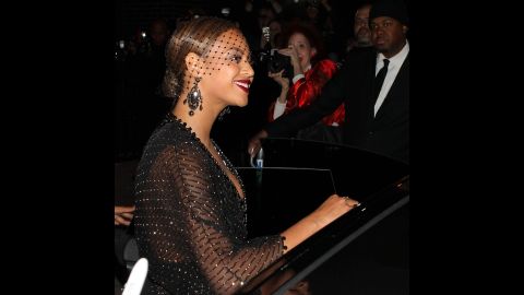 The onlooker also told People magazine that Solange didn't look disheveled but did appear "mad as hell." Beyonce seemed collected, smiling for the crowd outside the hotel. 