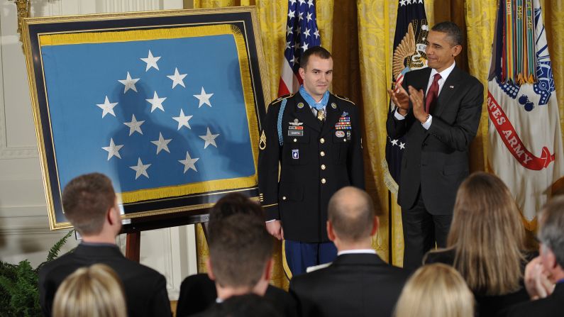 Obama applauds after presenting the Medal of Honor to Army Staff Sgt. Salvatore Giunta in November 2010. Cited for his actions in the Korengal Valley, Afghanistan, in October 2007, Guinta was the first living recipient of the Medal of Honor since the Vietnam War.