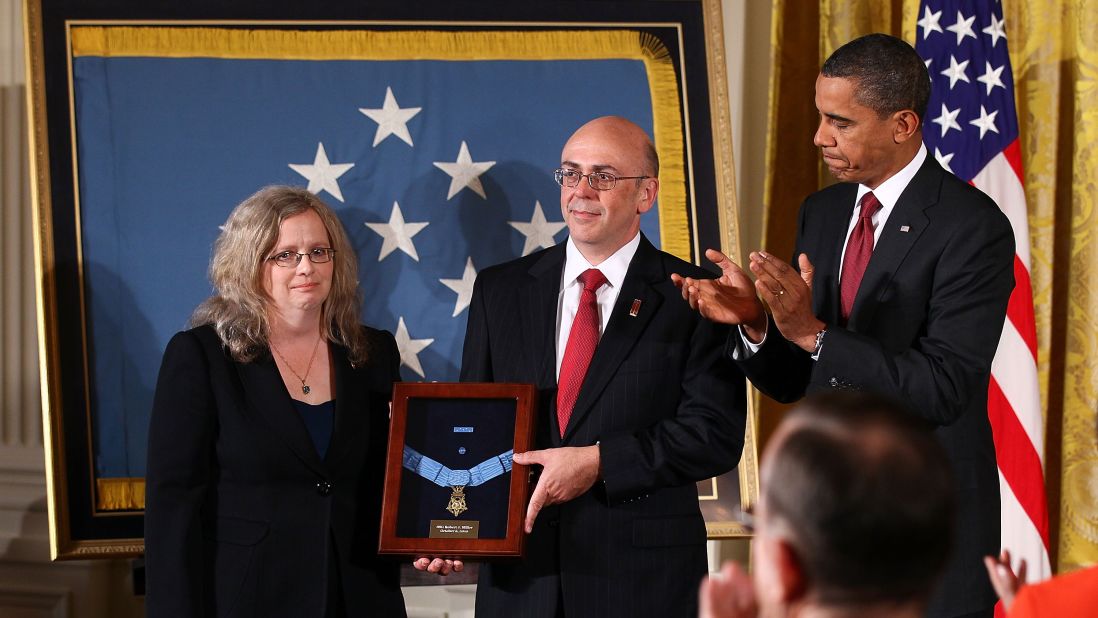 Phil and Maureen Miller receive the Medal of Honor on behalf of their son, Army Staff Sgt. Robert J. Miller, in October 2010. The soldier was cited for engaging more than 100 enemy fighters in the Gowardesh Valley, Afghanistan, on January 25, 2008. Miller killed 10 of the enemy and wounded dozens more before being mortally wounded by enemy fire.