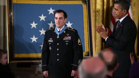 Obama presents the Medal of Honor to Army Staff Sgt. Clinton Romesha at the White House in February 2013. Wounded early in the battle at Command Outpost Keating on October 3, 2009, Romesha "continually exposed himself to heavy enemy fire as he moved confidently about the battlefield engaging and destroying multiple enemy targets," according to the Army.